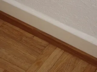 Baseboard refinishing